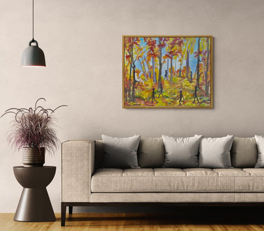 Autumn Spirits original expressionist autumn forest landscape oil painting with surreal shadow figures and a luminous spirit framed on a wall above a couch.