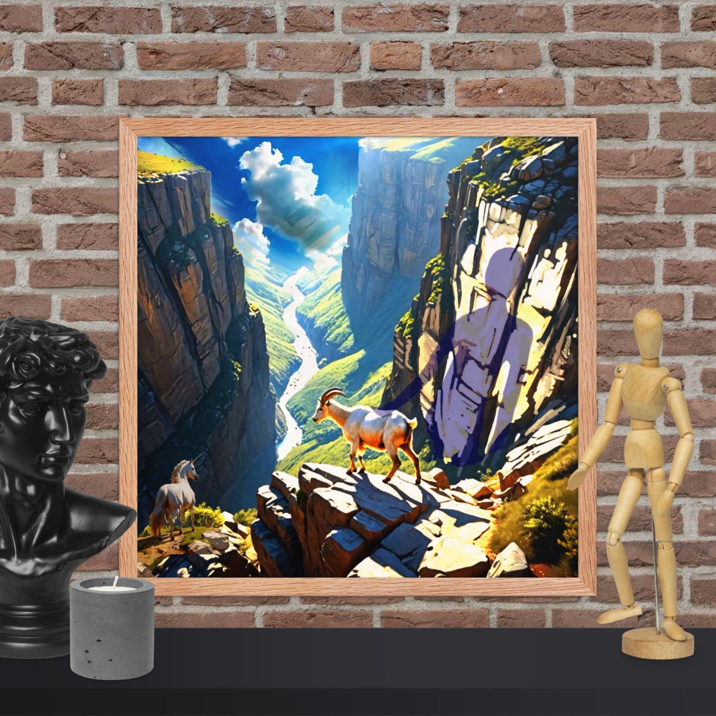 Canyon Wonderland fantasy fine art print framed and featuring a mountain goat, unicorn, and mysterious cliff shadow wall art, displayed with a mannequin on brick wall.