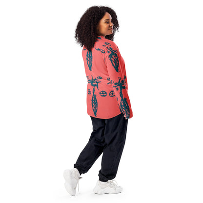 Side view of a woman wearing the recycled hockey fan jersey printed with symbols for scale and dimension.