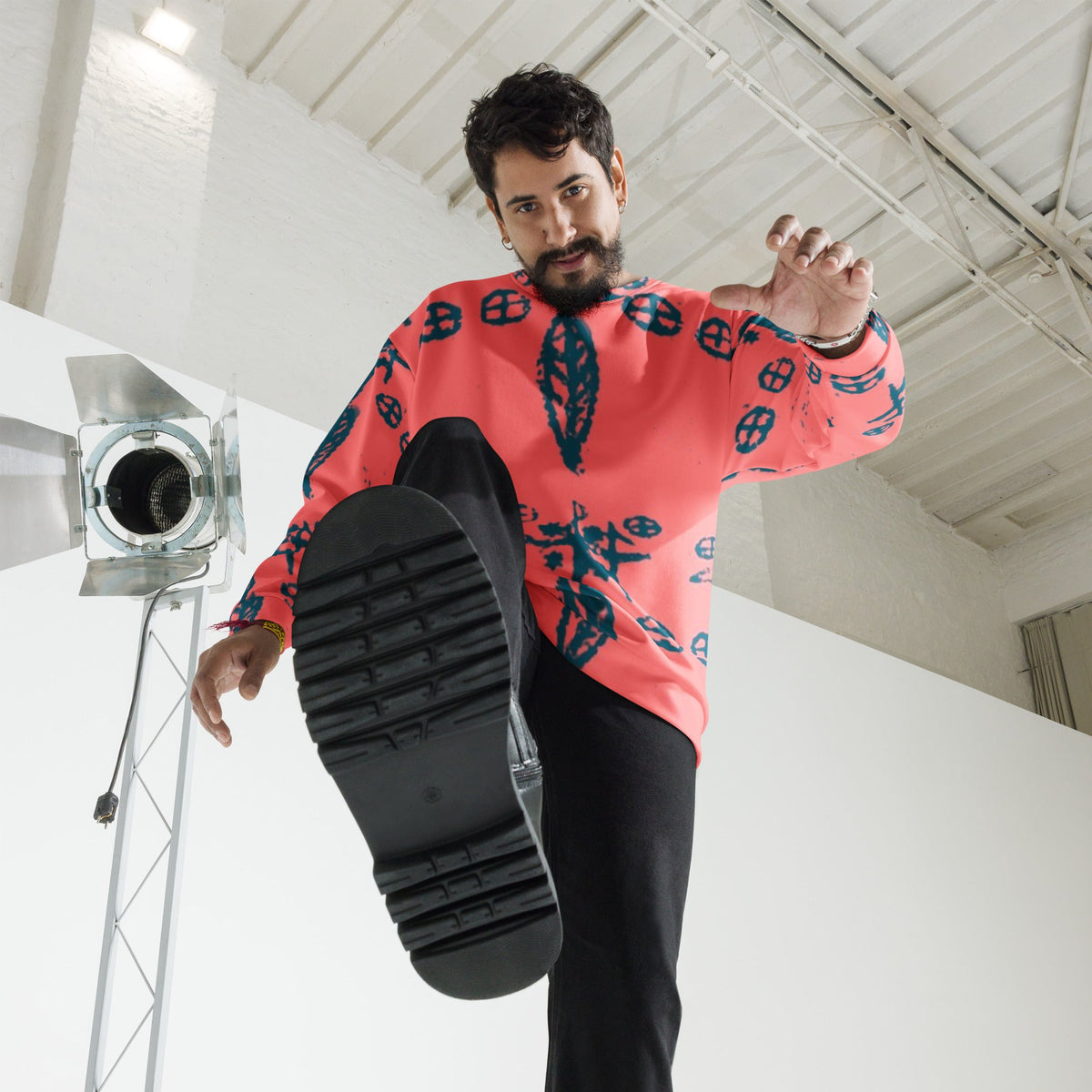 A man modeling the Fashion Print Sweatshirt designed by Delaney Henderson.